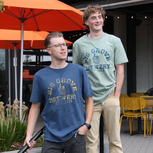 Two men with Big Grove t-shirts, one blue with yellow text, one light gray-green with blue text