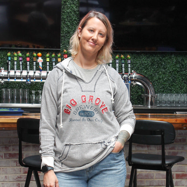 Big Grove Brewery striped hoodie on woman