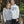 Load image into Gallery viewer, Man and woman wearing Big Grove sweatshirts
